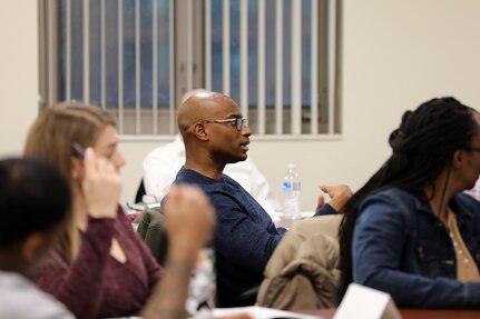 A student asks questions during a tier 2 Ask, Care, Escort – Suicide Prevention training event held at the 85th U.S. Army Reserve Support Command headquarters, April 4-6, 2023.