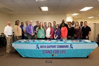 Students and instructors pause for a photo during a tier 2 Ask, Care, Escort – Suicide Prevention training event held at the 85th U.S. Army Reserve Support Command headquarters, April 4-6, 2023.