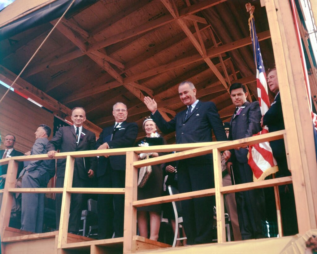 Vice President Lyndon B. Johnson waving from stage