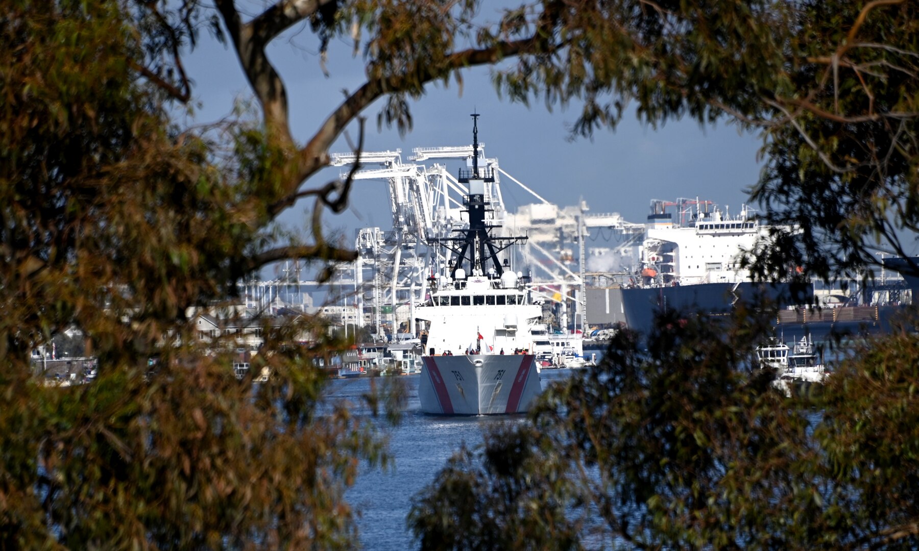 The Coast Guard Cutter Waesche (WMSL 751) transits the Oakland Estuary as the crew navigates home to Coast Guard Base Alameda, California, March 31, 2023, following a 90-day counternarcotics deployment. Waesche’s crew interdicted two suspected drug-smuggling vessels while patrolling international waters of the Eastern Pacific Ocean, resulting in the seizure of approximately 881 pounds of cocaine and 9,500 pounds of marijuana. U.S. Coast Guard photo by Chief Petty Officer Matthew Masaschi.