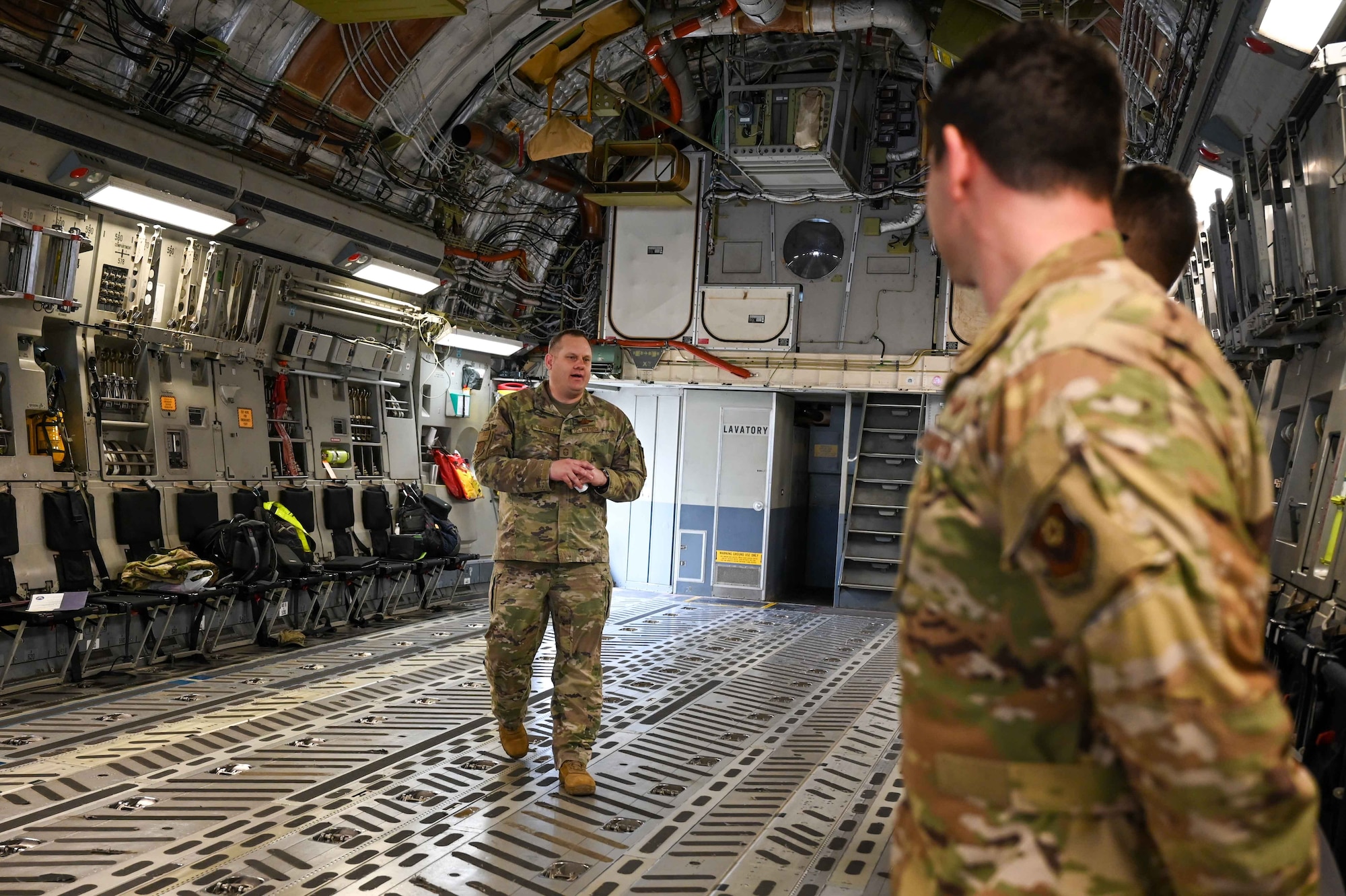 U.S. Air Force Chief Master Sgt. Jason Schelke, 97th Operations Group senior enlisted leader, gives the keynote speech to a class of graduating loadmasters at Joint Base San Antonio-Lackland, Texas, April 6, 2023. Eight of the graduates will eventually move on to Altus Air Force Base, Oklahoma to finish out their loadmaster training. (U.S. Air Force photo by Airman 1st Class Kari Degraffenreed)