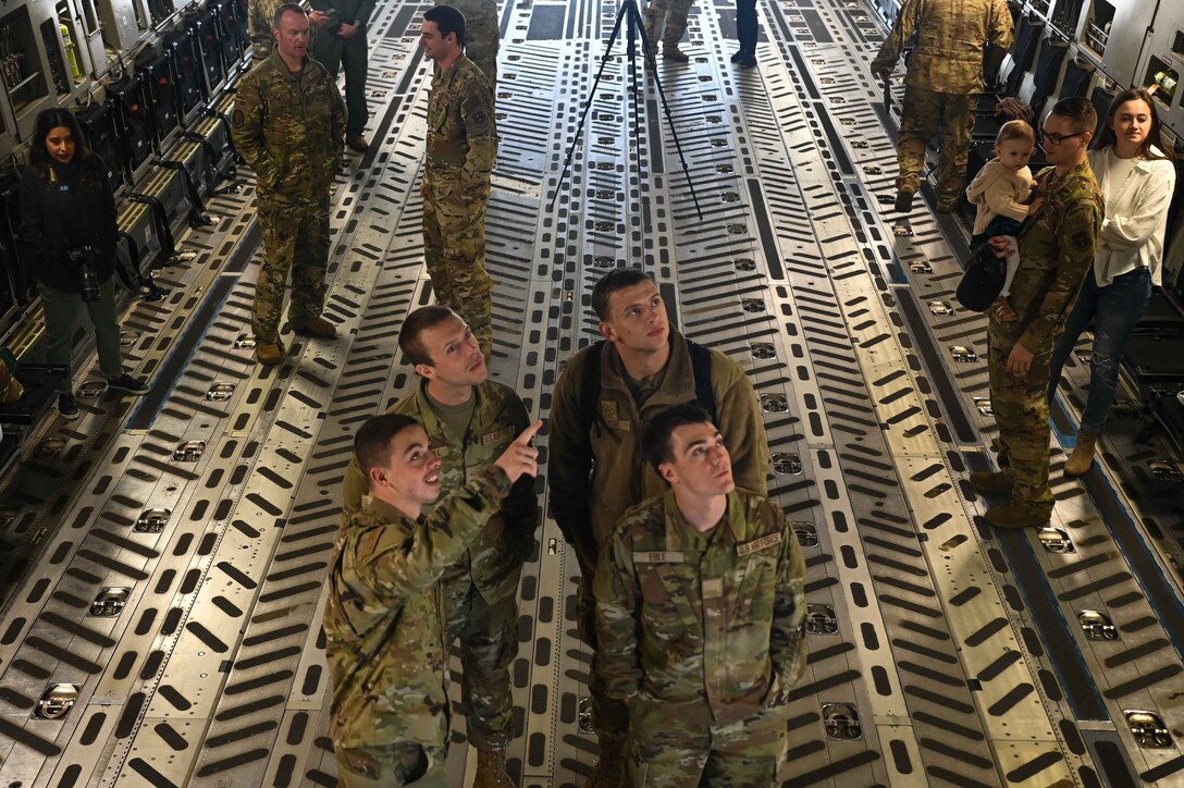 Students from the Career Enlisted Aviator Center for Excellence marvel at the C-17Globemaster III at Joint Base San Antonio-Lackland, Texas, April 6, 2023. With the new changes to the CEA Center for Excellence courses, Airmen will receive training in several different enlisted aviation courses before going on to their more specialized training. (U.S. Air Force photo by Airman 1st Class Kari Degraffenreed)