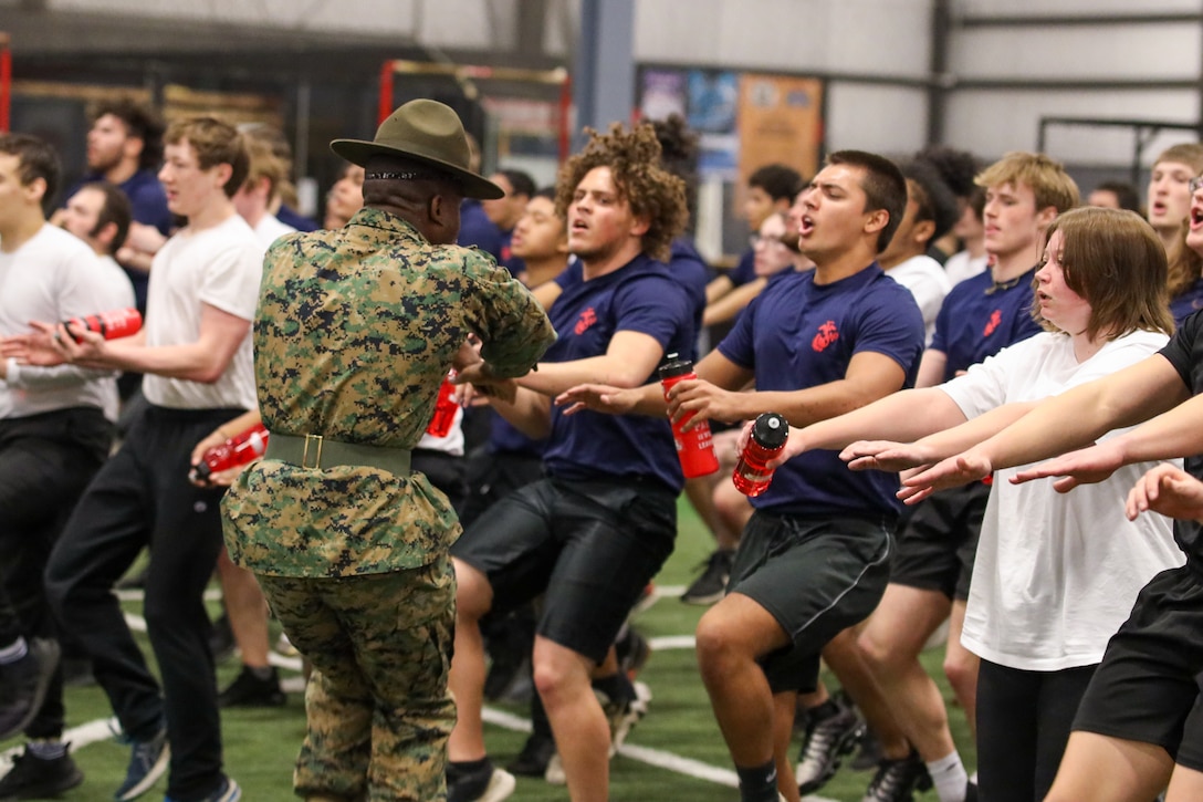 U.S. Marine Corps Sgt. Davonte Perry, a drill instructor with Echo Company, 2nd Recruit Training Battalion, Recruit Training Regiment, demonstrates an incentive training period for poolees in Rossford, Ohio, March 18, 2023. The annual pool function serves as an opportunity to build teamwork and camaraderie, and it serves as an event for potential future Marines to get first hand experience on drill instructors. (U.S. Marine Corps photo by Cpl. Austin Molla)