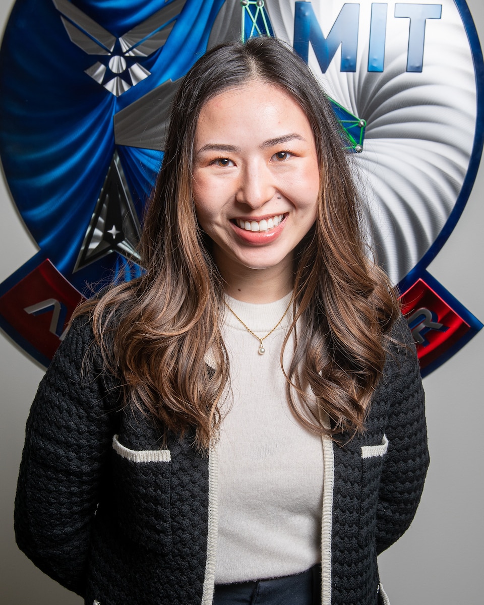 U.S. Air Force 1st Lieutenant Michelle McGee, Project Liaison, DAF-MIT Artificial Intelligence Accelerator (AIA), poses for a photo at the AIA office, Cambridge, Mass., April 5, 2023. The AI Accelerator leverages universities, small businesses, traditional defense, and non-traditional commercial ventures, collaborating with the Air Force and Space Force to develop and ensure the ethical use of AI technologies for society and the nation. (U.S. Air Force photo by Tech. Sgt. Brycen Guerrero)