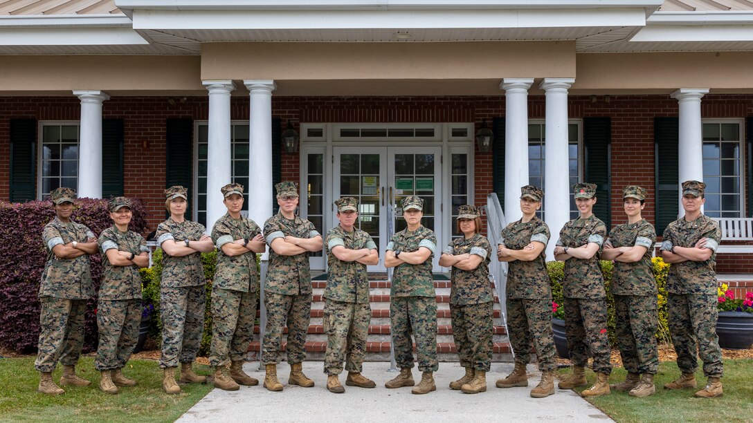 U.S. Marine Corps leaders with Marine Corps Instillation East, pose for a group photo during a Woman Marine Commanders Assembly, aboard Marine Corps Base Camp Lejeune, North Carolina, April 5, 2023. The 14 women commanders organized the informal meeting to discuss a variety of topics, ranging from personal experiences, MAGTF operations, readiness, and challenges facing their respective units. (U.S. Marine Corps photo by Sgt. Yvonna Guyette)