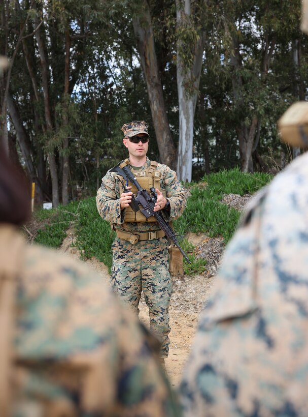 U.S. Marine Corps 1st Lt. Carter Fishback, a logistics officer with I Marine Expeditionary Force Support Battalion, I Marine Expeditionary Force Information Group, gives a debrief for a day-convoy during a mini exercise on Marine Corps Base Camp Pendleton, California, Feb. 13, 2023. The mini exercise was conducted to familiarize Marines with equipment, tactical convoy training and battalion tactical standard operating procedures in preparation for Exercise Balikatan 2023. (U.S. Marine Corps photo by Sgt. Anabel Abreu Rodriguez)