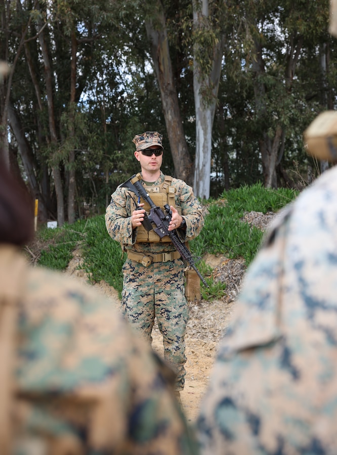 U.S. Marine Corps 1st Lt. Carter Fishback, a logistics officer with I Marine Expeditionary Force Support Battalion, I Marine Expeditionary Force Information Group, gives a debrief for a day-convoy during a mini exercise on Marine Corps Base Camp Pendleton, California, Feb. 13, 2023. The mini exercise was conducted to familiarize Marines with equipment, tactical convoy training and battalion tactical standard operating procedures in preparation for Exercise Balikatan 2023. (U.S. Marine Corps photo by Sgt. Anabel Abreu Rodriguez)