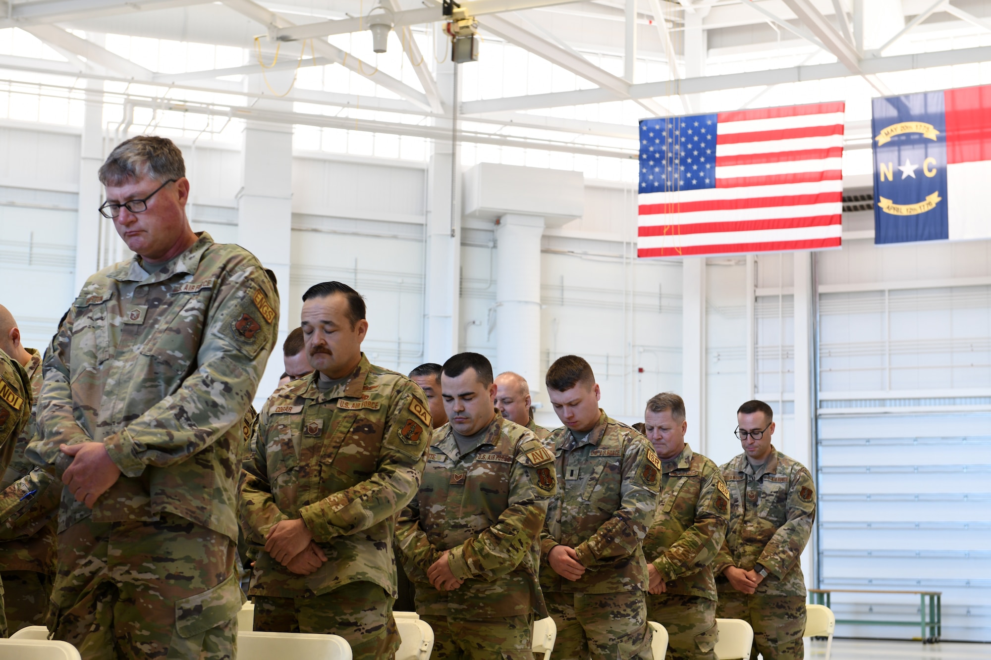 Members of the North Carolina Air National guard stands respectfully during the 75th anniversary and ribbon-cutting ceremony.