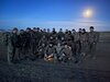 Advisors from 5th SFAB pose with Mongolian students during the Junior Sergeant Course held in Mongolia, Winter 2022-2023. SFAB Advisors partnered with and mentored Mongolian students during this NCO education course during their six months they were employed in Mongolia.