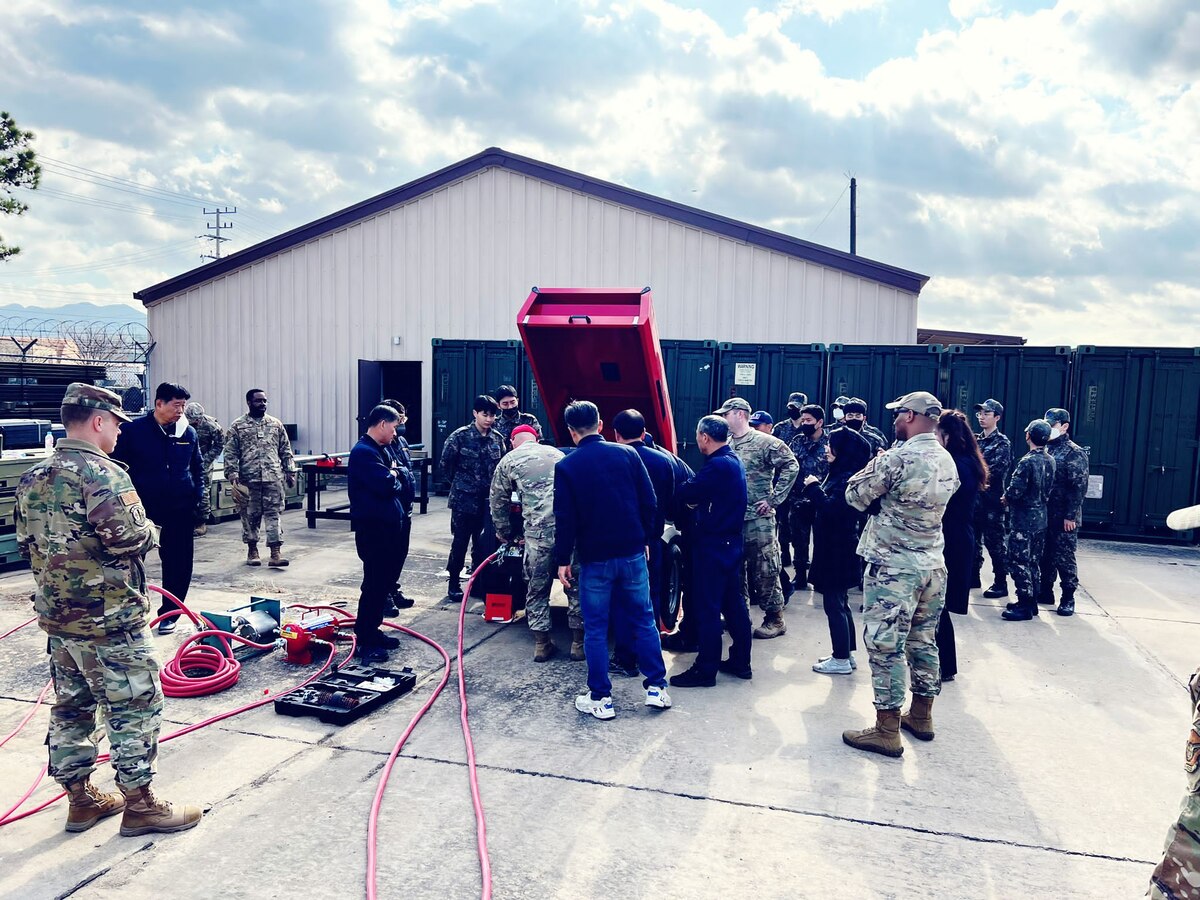 U.S. Air Force instructors with the 554th Rapid Engineer Deployable Heavy Operational Repair Engineer Squadron show students how to set up an air compressor during a training course at Daegu Air Base, Republic of Korea, March 13-16, 2023.