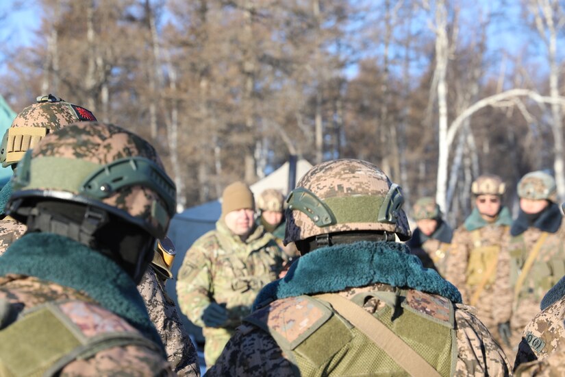 1st Sgt. Fernando Villafana, Company Advisor Team 5220, 2nd Battalion, 5th Security Force Assistance Brigade, leads a safety briefing prior to training in Mongolia, Jan. 2023. SFAB Advisors spent six month in Mongolia, beginning in Oct. 2022.