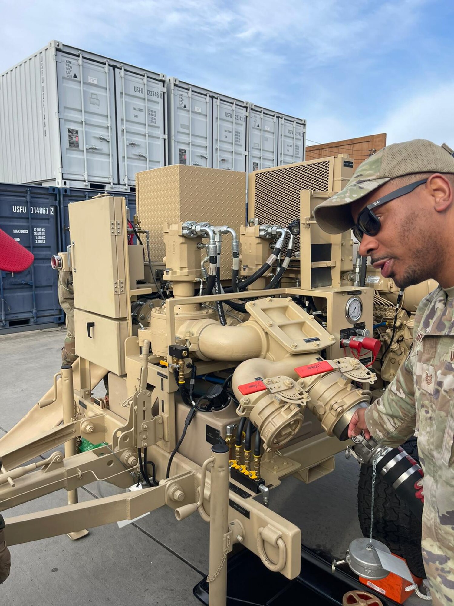 U.S. Air Force Tech. Sgt. Marvin Carter, 607th Material Maintenance Squadron water and fuel maintenance craftsman, asks a question about
a water and fuel pump during a training course at Daegu Air Base, Republic of Korea March 13-16, 2023.