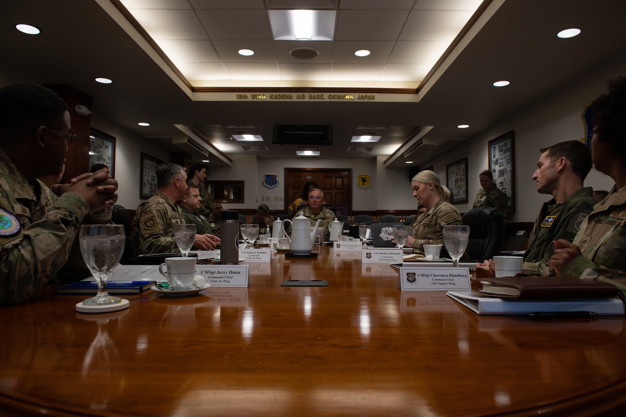 Airmen speak during a conference.