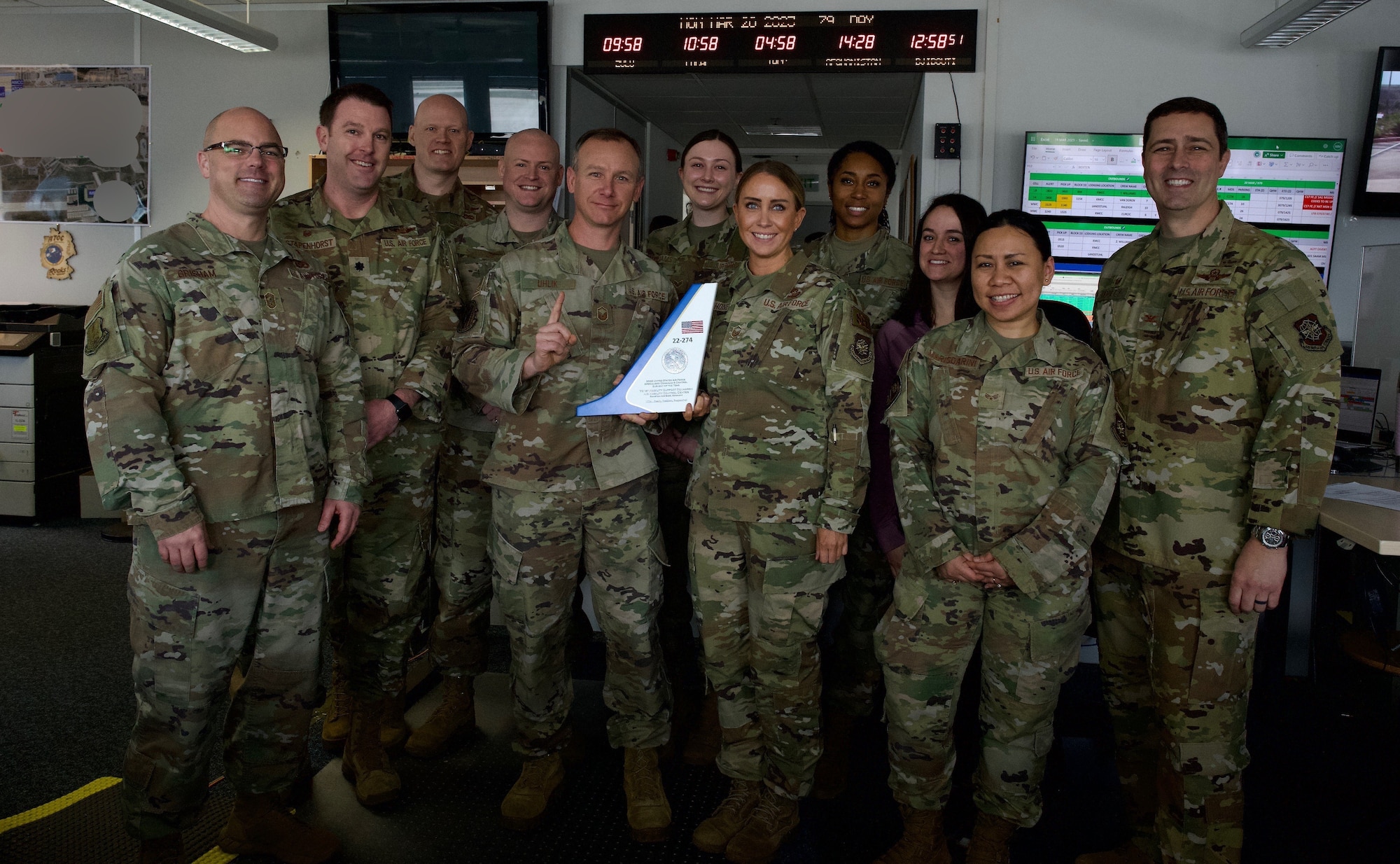 521st Air Mobility Operations Wing Airmen and leaders pose for a photo on Ramstein Air Base, Germany, March 20, 2023.