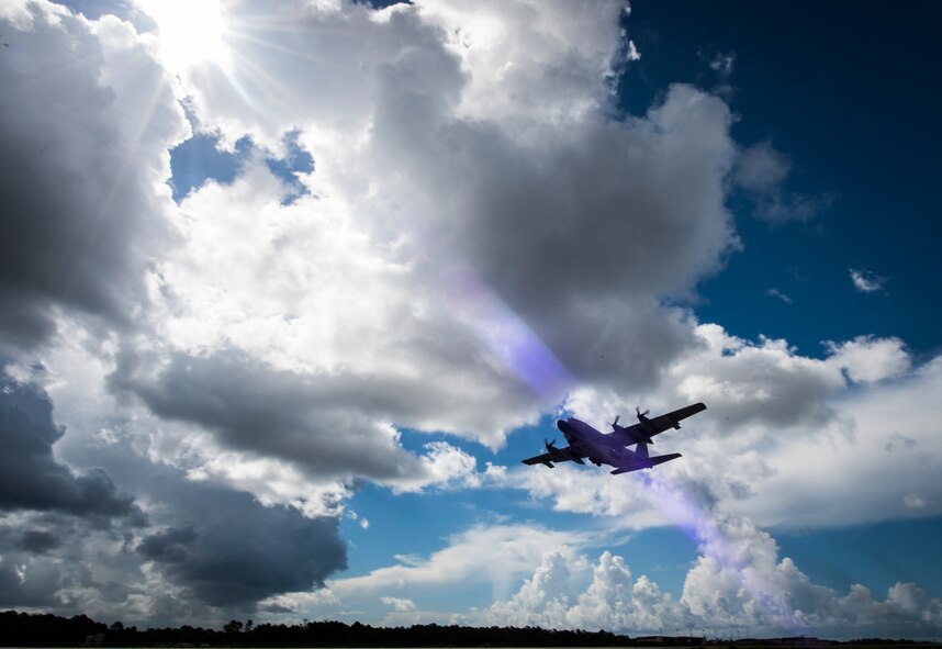 A 15th Special Operations Squadron MC-130H Combat Talon II flies over Hurlburt Field, Fla., during a training mission July 7, 2017.