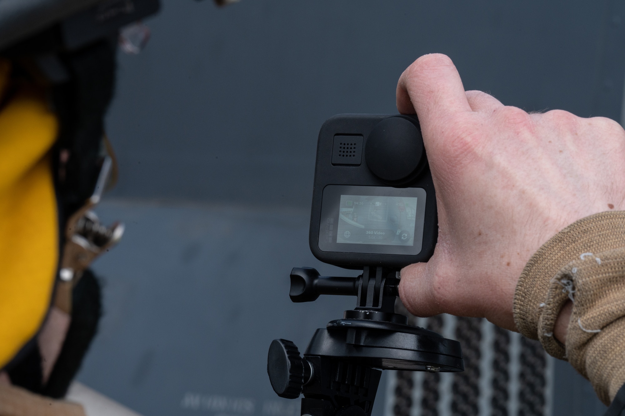 Mark Matless, 100th Civil Engineering Squadron firefighter, records the scene of a simulated fire of a CV-22B Osprey aircraft assigned to the 352nd Special Operations Wing, March 31, 2023, at Royal Air Force Mildenhall, England.