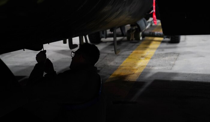 A U.S. Air Force 9th Aircraft Maintenance Squadron crew chief secures panels on a U-2 Dragon Lady, April 1, 2023, at Offutt Air Force Base, Nebraska.
