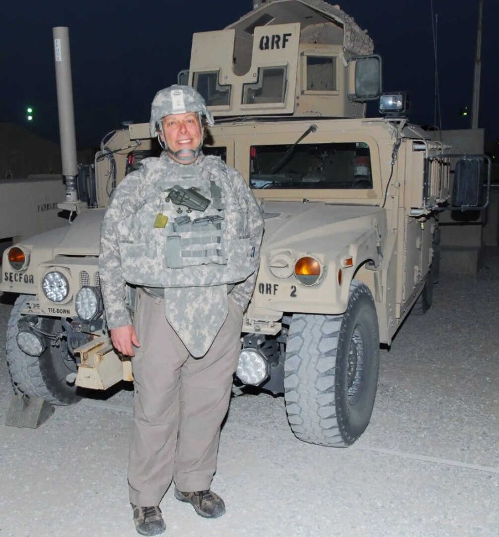Peter St. James dons standard traveling gear during his 2011 trip to Kuwait to report on the 197th Fires Brigade mission in support of Operation New Dawn. NHNG archive photo.