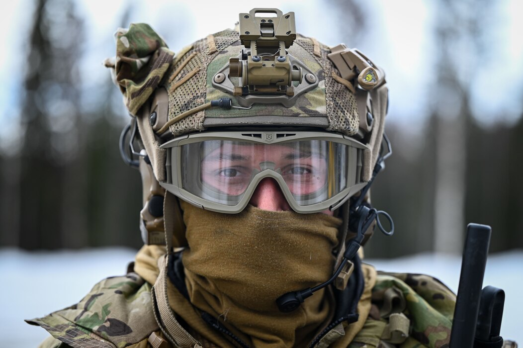U.S. Air Force Airman 1st Class Cameron St. Amand, 3rd Air Support Operations Squadron precision strike operator, poses for a photo before beginning his ground infiltration during an arctic training in Delta Junction, Alaska, March 23, 2023.