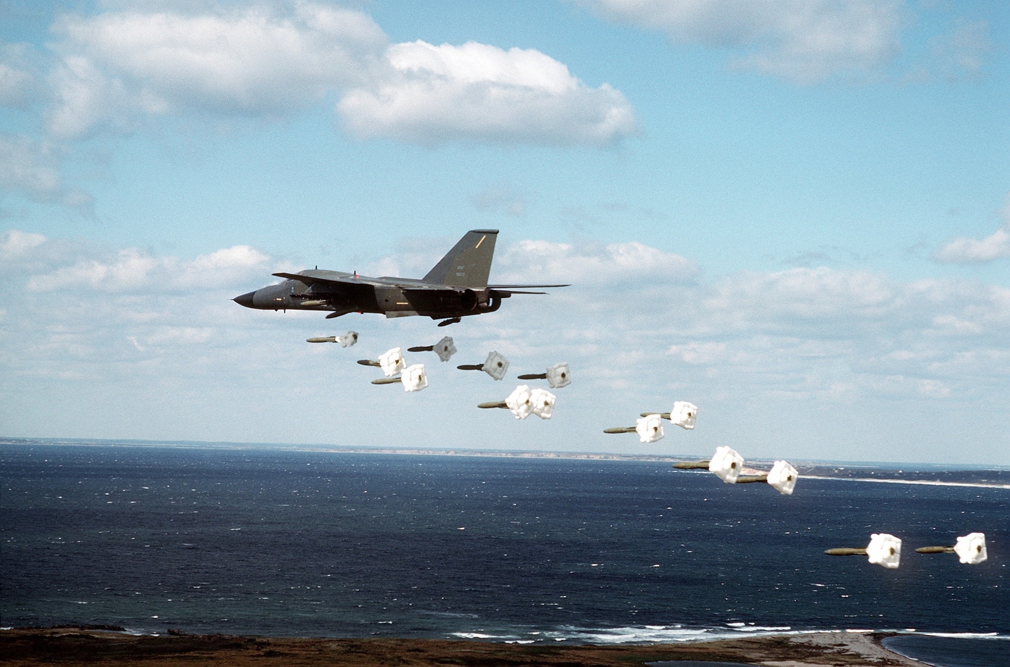 F-111 Aardvark flies over the coast