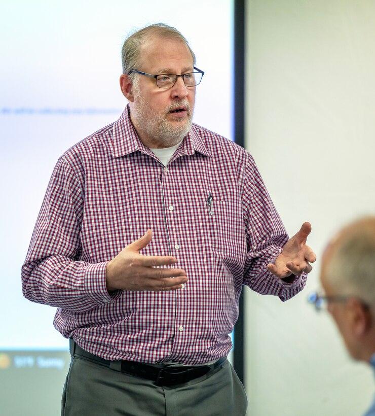 Keith Solheim, operations manager, Code 301, Operations, leads a discussion on fire response processes during the Northwest Regional Fire Safety, Prevention and Response Summit at the Undersea Naval Museum in Keyport, Washington. (U.S Navy photo by Ben Hutto)