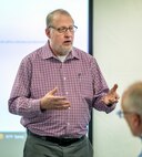 Keith Solheim, operations manager, Code 301, Operations, leads a discussion on fire response processes during the Northwest Regional Fire Safety, Prevention and Response Summit at the Undersea Naval Museum in Keyport, Washington. (U.S Navy photo by Ben Hutto)