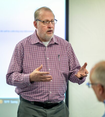 Keith Solheim, operations manager, Code 301, Operations, leads a discussion on fire response processes during the Northwest Regional Fire Safety, Prevention and Response Summit at the Undersea Naval Museum in Keyport, Washington. (U.S Navy photo by Ben Hutto)