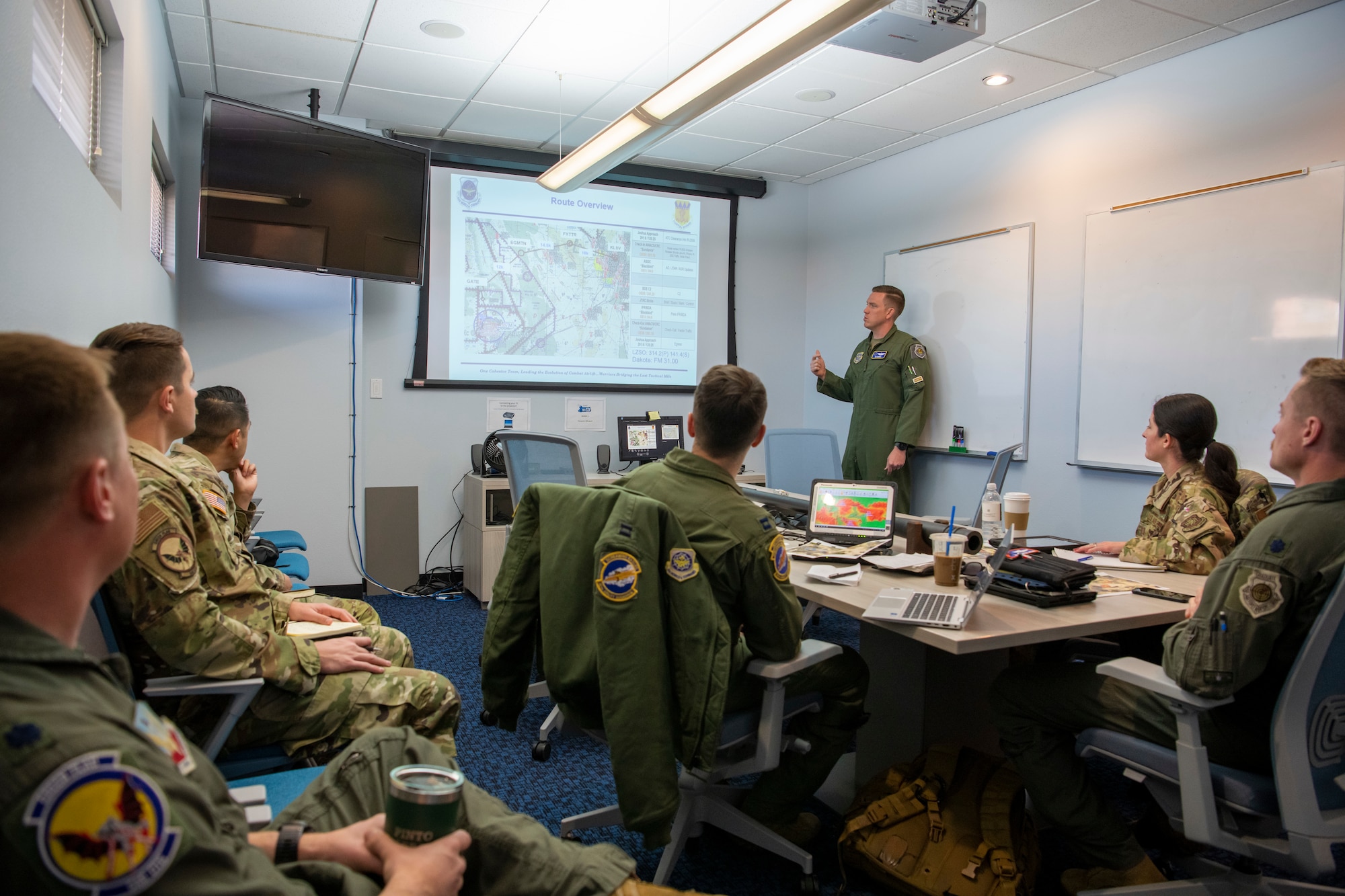U.S. Air Force Capt. Nathaniel Roberts, 40th Airlift Squadron pilot, briefs aircrew during Operation Night King at Nellis Air Force Base, Nevada, March 26, 2023.