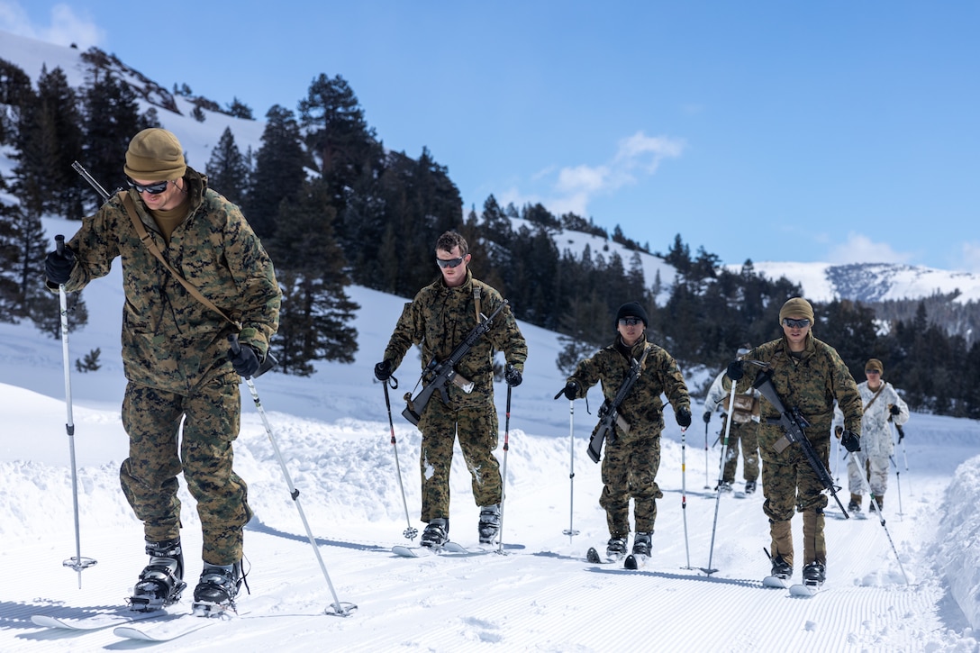 US Marines skiing during a biathlon training event