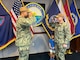 NAVAL BASE GUAM (April 6, 2023) - Cmdr. Stephen Ansuini, the outgoing executive officer of U.S. Naval Base Guam (NBG), salutes Cmdr. Phil Smith, the incoming executive officer for NBG during a turnover ceremony at the NBG Headquarters, April 6.