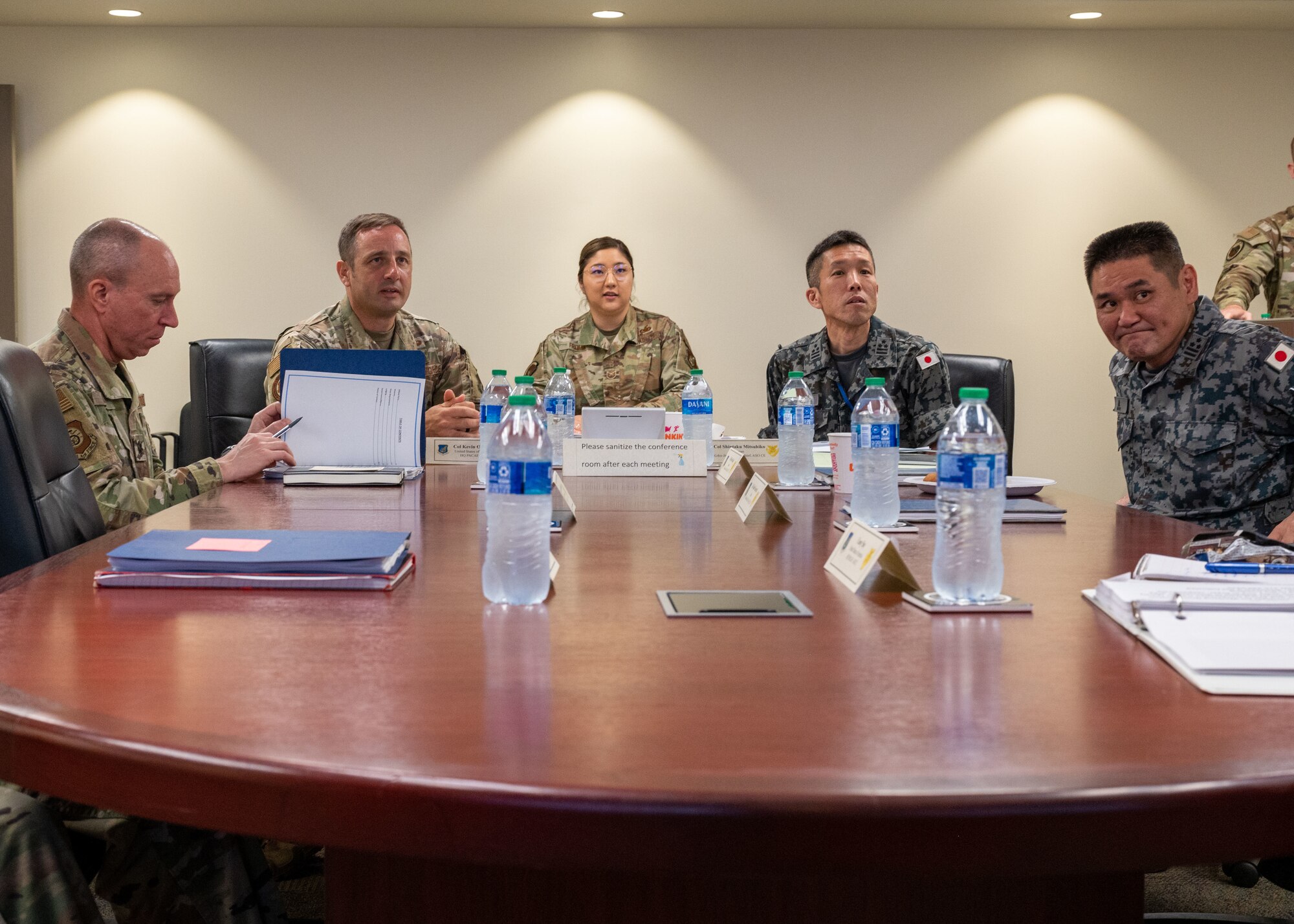 Photo of U.S. Air Force and Japan Air Self Defense Force officers attending a briefing.