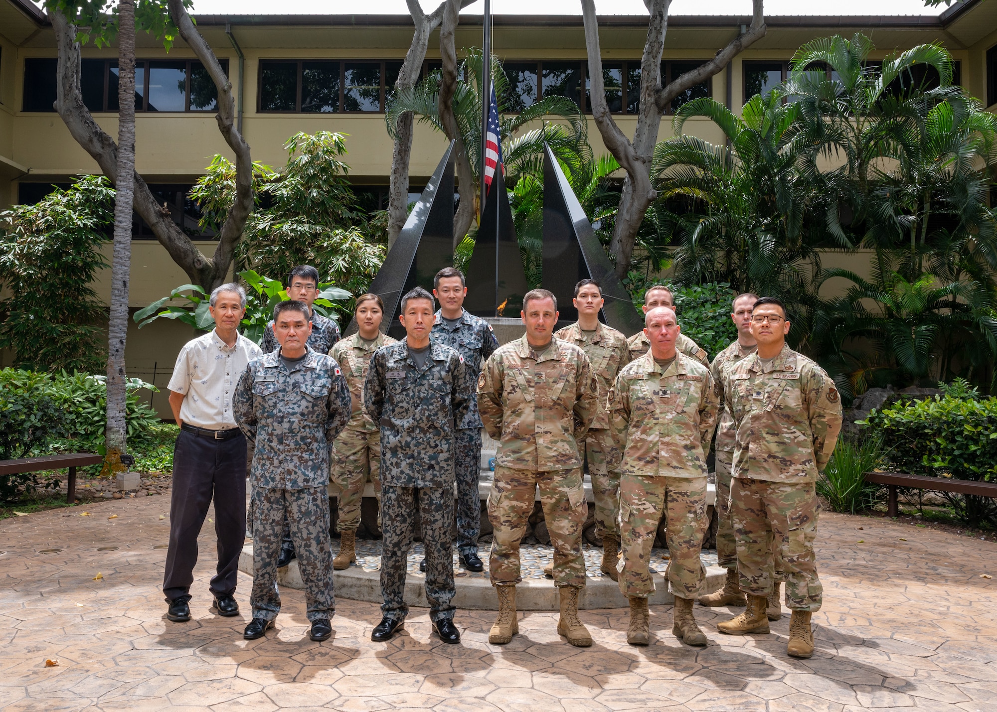 Group photo of U.S. Air Force and Japan Air Self Defense Force Airmen standing together.