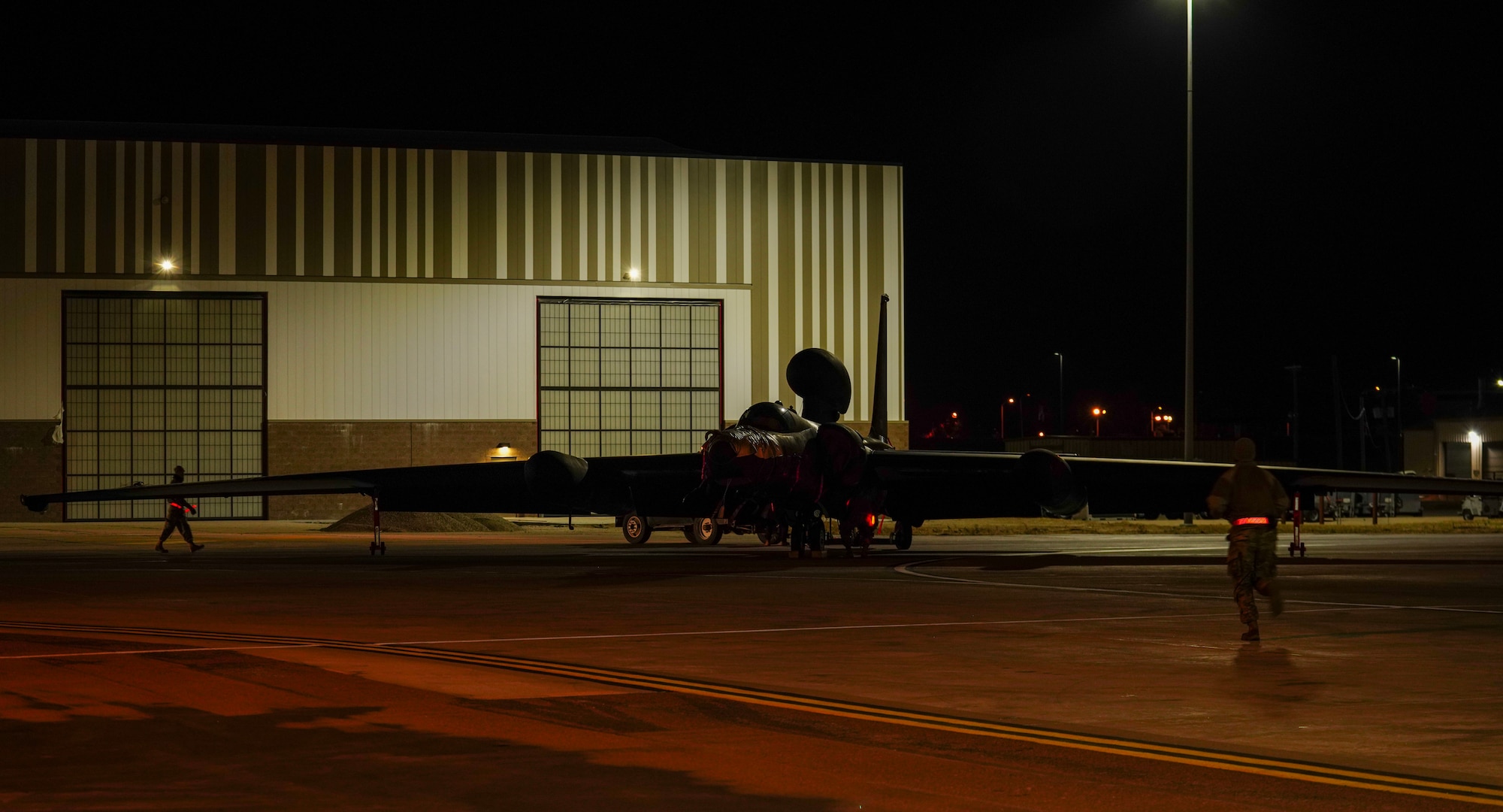 U.S. Air Force 9th Aircraft Maintenance Squadron Airmen position themselves to marshall in the U-2 Dragon Lady, March 27, 2023, at Offutt Air Force Base, Nebraska.