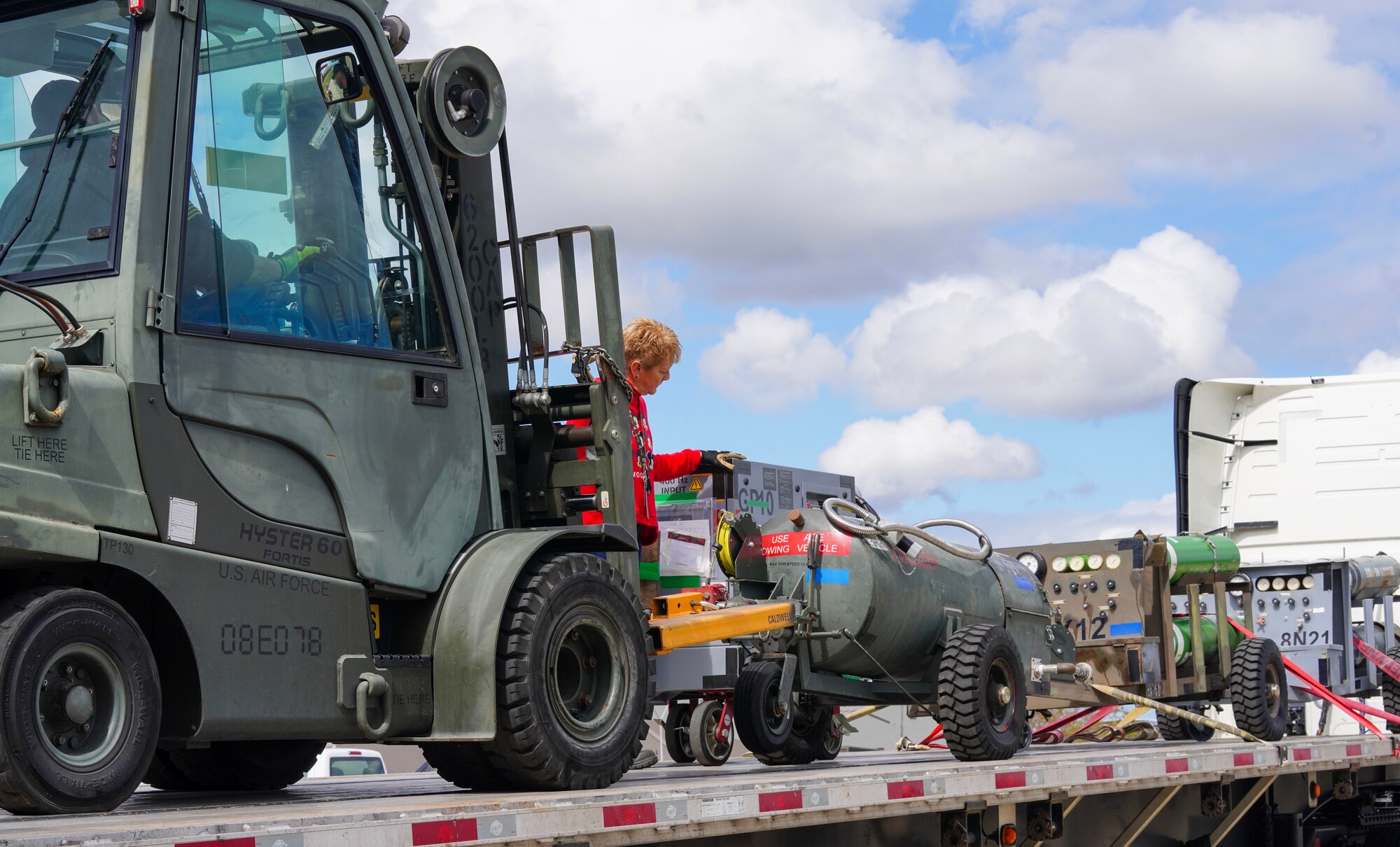 U.S. Air Force 9th Logistics Readiness Squadron training management office personnel load equipment onto trucks March 20, 2023, at Beale Air Force Base, California.