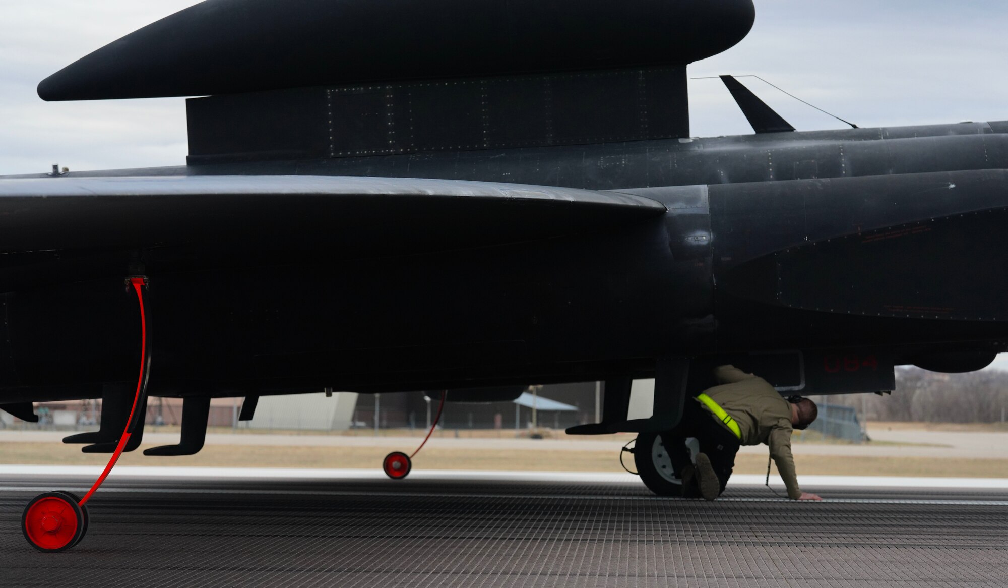 A U.S. Air Force 9th Aircraft Maintenance Squadron airframe and powerplant general technician inspects the fuselage of a U-2 Dragon Lady, April 3, 2023, at Offutt Air Force Base, Nebraska.