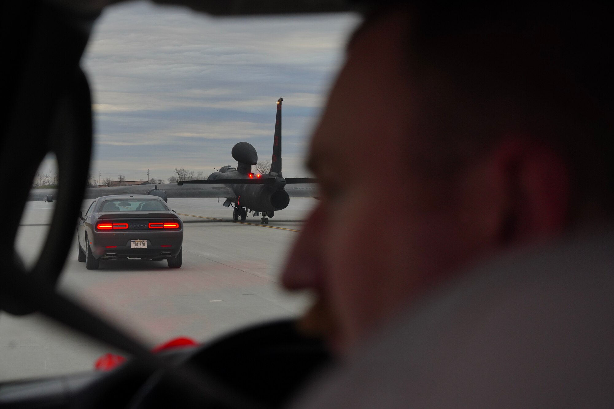 A U.S. Air Force 9th Aircraft Maintenance Squadron airframe and powerplant general technician drives the pogo truck behind a U-2 Dragon Lady during Dragon Flag EAST, April 3, 2023, at Offutt Air Force Base, Nebraska.