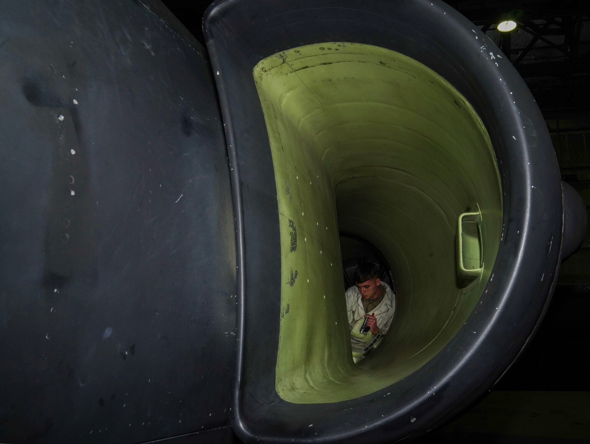 A U.S. Air Force 9th Maintenance Squadron aerospace propulsion journeyman conducts an inlet inspection on a U-2 Dragon Lady in support of Dragon Flag EAST, April 1, 2023, at Offutt Air Force Base, Nebraska.