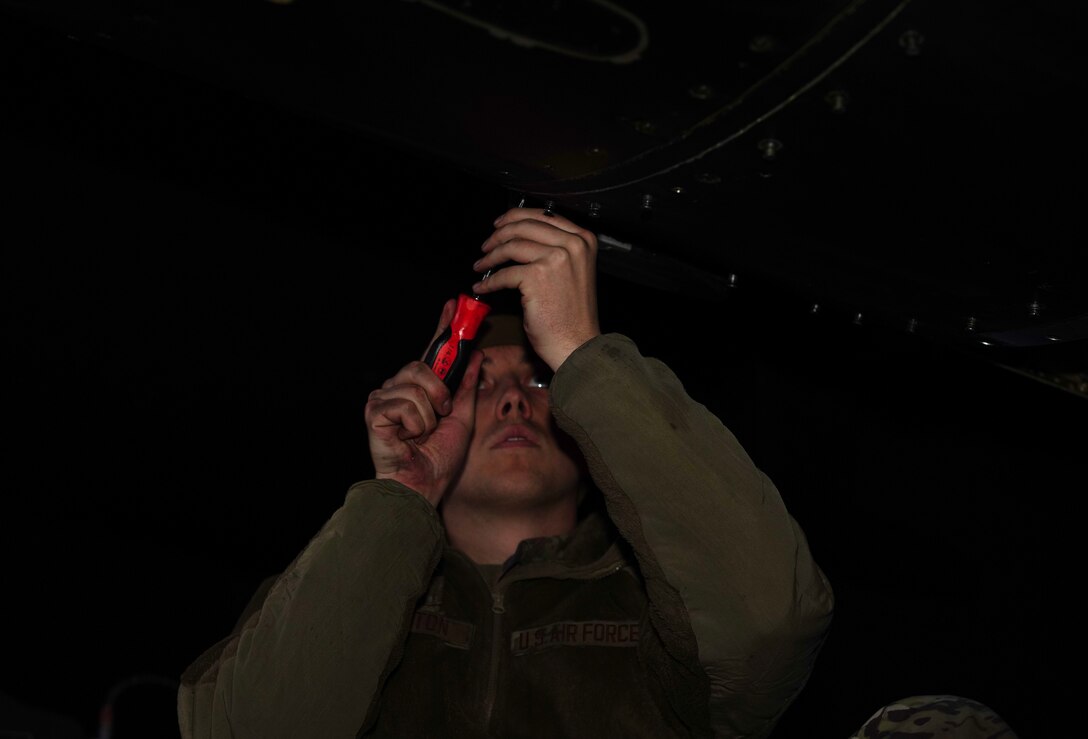 A U.S. Air Force 9th Maintenance Squadron aerospace propulsion journeyman secures the engine bay panels on a U-2 Dragon Lady, April 1, 2023, at Offutt Air Force Base, Nebraska.