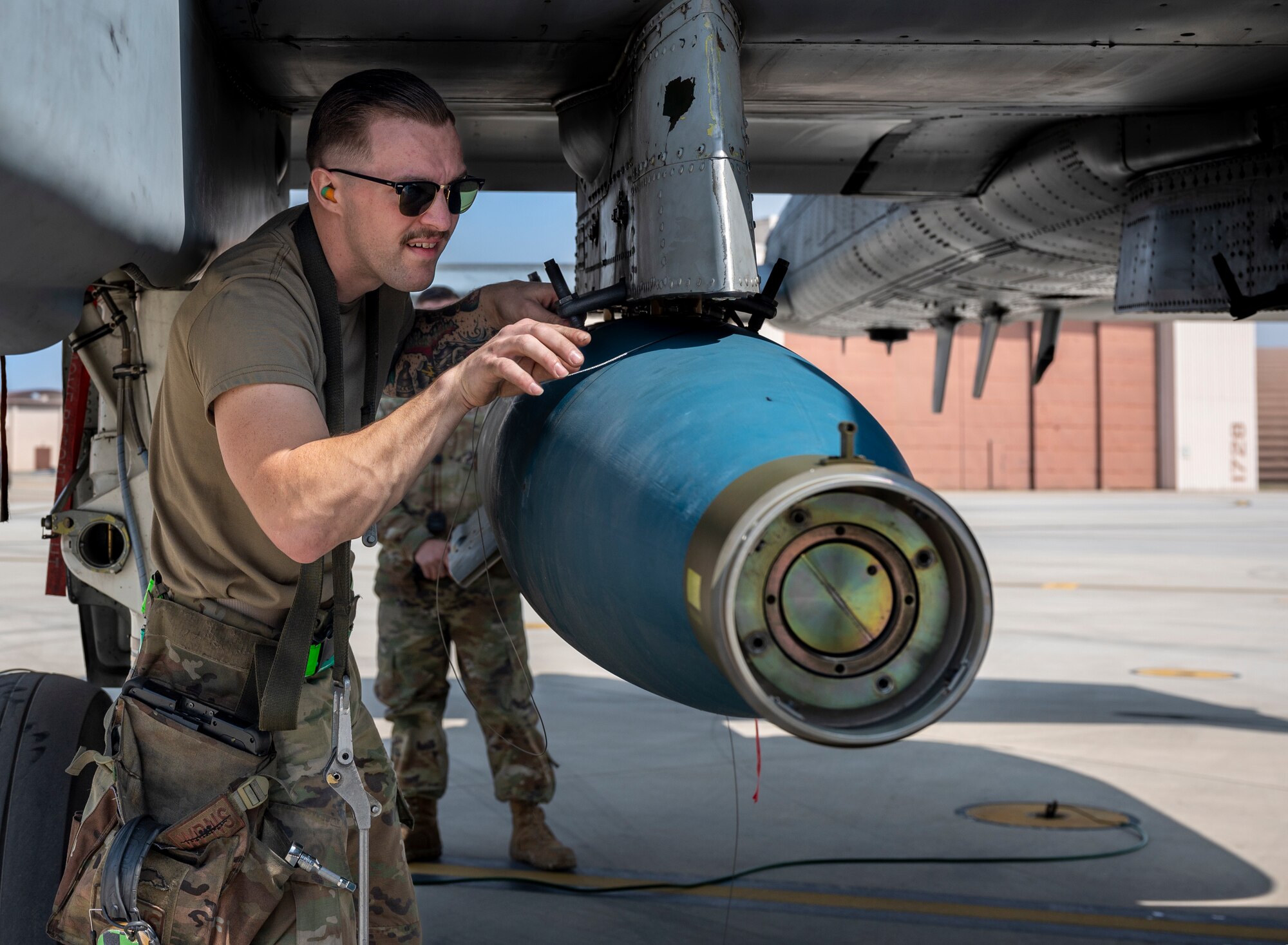 U.S. Air Force Staff Sgt. Andre Kitz, 25th Fighter Generation Squadron weapons load crew member, participates in a weapons load crew of the quarter competition at Osan Air Base, Republic of Korea, March 31, 2023.