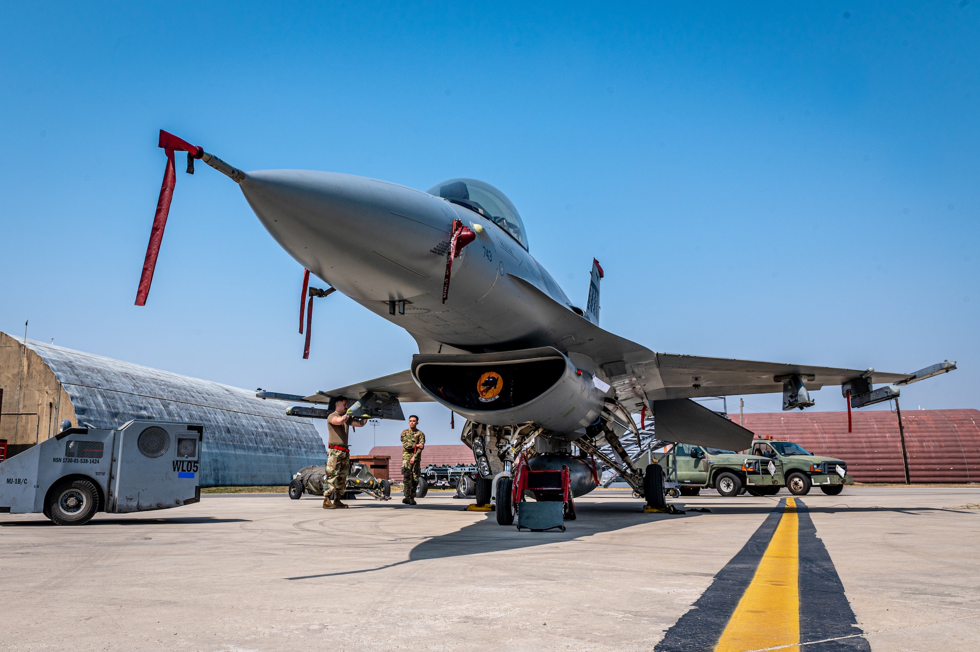 A U.S. Air Force F-16 Fighting Falcon assigned to the 36th Fighter Squadron has weapons loaded during a weapons load crew of the quarter competition at Osan Air Base, Republic of Korea, Mar. 31, 2023.