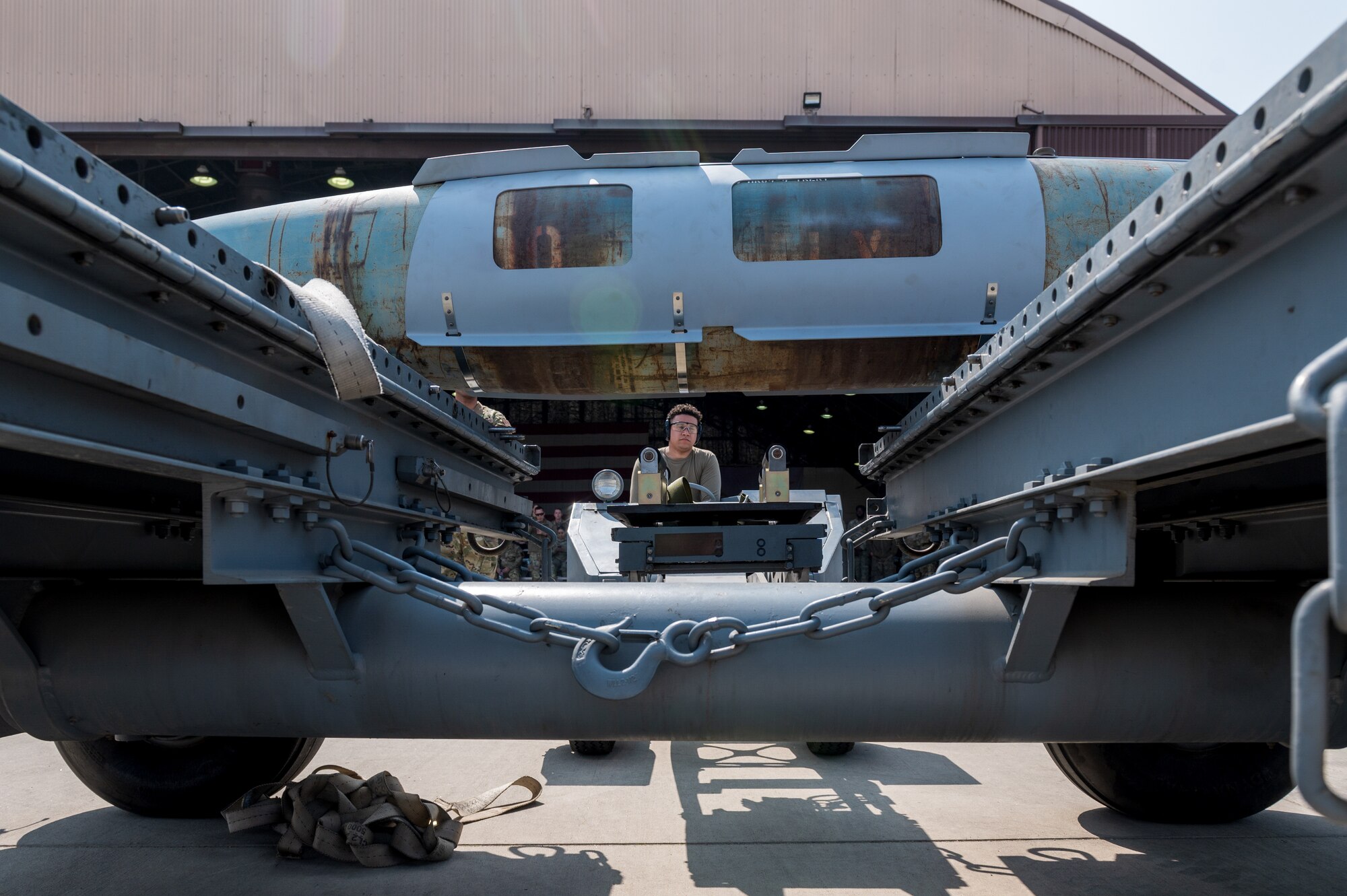 U.S. Air Force Senior Airman Angel Ferrer, 36th Fighter Generation Squadron weapons load crew member, operates an aerial stores lift truck during a quarterly load crew competition at Osan Air Base, Republic of Korea, Mar. 31, 2023.