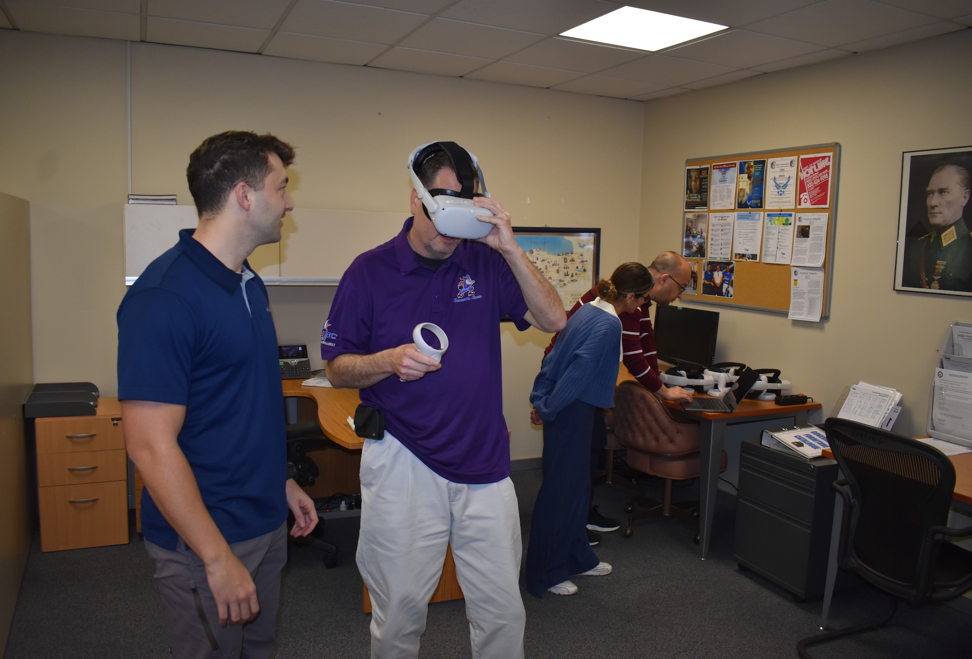 Asa Peck, 425th Air Base Squadron housing manager, tests the virtual reality headset, at the housing office at the Izmir Consolidated Center, March 30, 2023.