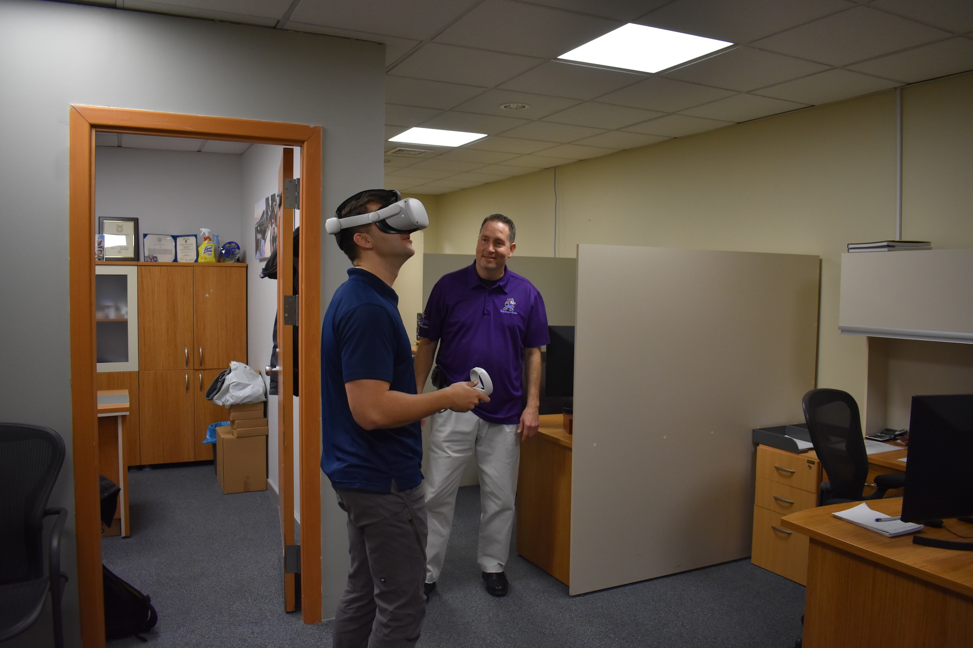 Senior Airman Houston Comer, 425th Air Base Squadron base defense operations center controller, takes a virtual tour of the apartments in Izmir via a virtual reality headset, at the housing office at the Izmir Consolidated Center, March 30, 2023.