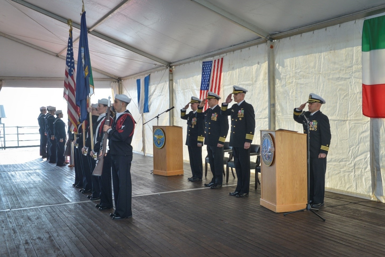 (April 11, 2023) Vice Adm. Thomas Ishee, commander, U.S. Sixth Fleet, Capt. Daniel Prochazka, commanding officer of the Blue Ridge-class command and control ship USS Mount Whitney (LCC 20), and Capt. Matthew Kiser, salutes during a change of command in Gaeta, Italy, April 11, 2023. Mount Whitney, the U.S. Sixth Fleet flagship, homeported in Gaeta, Italy entered its regularly scheduled overhaul to make improvements in order to increase the security and stability of the U.S. Sixth Fleet area of operations.