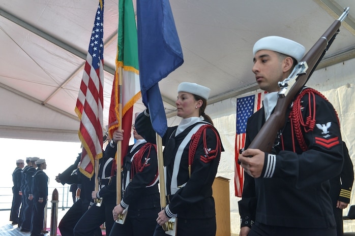 (April 11, 2023) Sailors present arms and flags during the ship’s change of command in Gaeta, Italy, April 11, 2023. Mount Whitney, the U.S. Sixth Fleet flagship, homeported in Gaeta, Italy entered its regularly scheduled overhaul to make improvements in order to increase the security and stability of the U.S. Sixth Fleet area of operations.