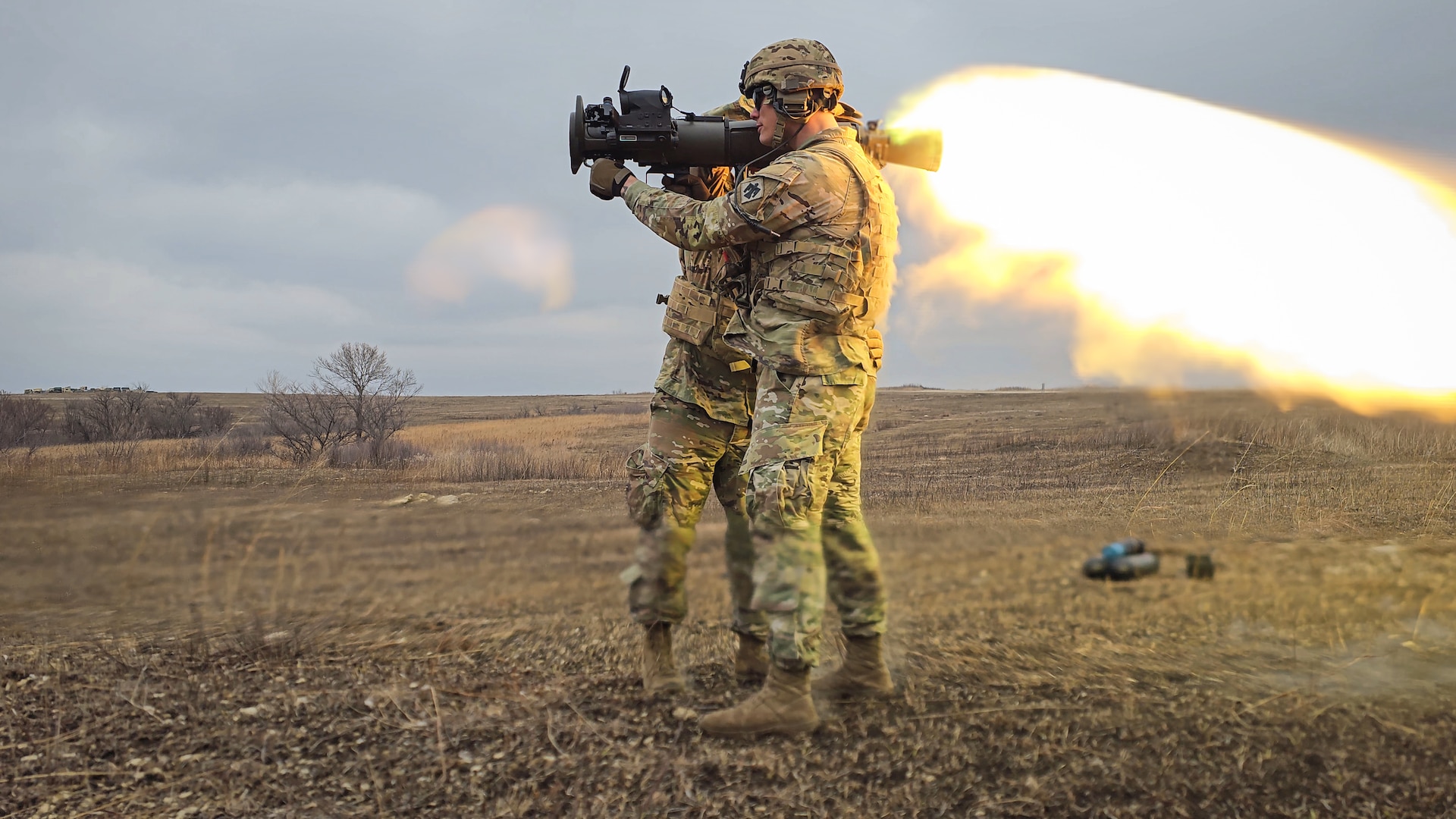 Soldiers with Headquarters and Headquarters Company, 179th Infantry Regiment, 45th Infantry Brigade Combat Team, Oklahoma Army National Guard, fire an AT4, a shoulder fired, recoilless anti-tank weapon, at Fort Riley, Kan., March 26, 2023. 45th IBCT Soldiers conducted pre-mobilization training in preparation for their upcoming deployment as Task Force Tomahawk supporting operations across three East African countries. (Oklahoma National Guard photo by Spc. Danielle Rayon)
