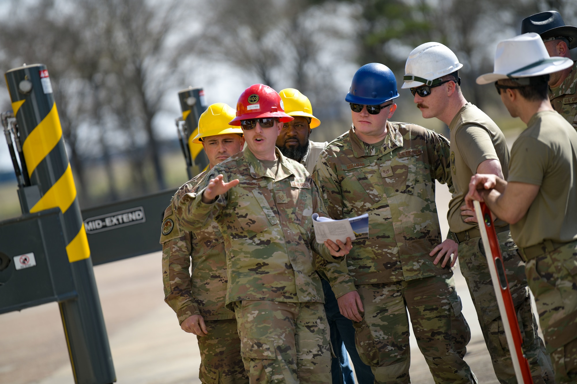 Tech. Sgt. Cody Lehman, a heavy equipment instructor with the 201st RED HORSE Squadron, Fort Indiantown Gap, Pennsylvania, instructs a group of Airmen from the 172nd Maintenance Group and 172nd Civil Engineer Squadron