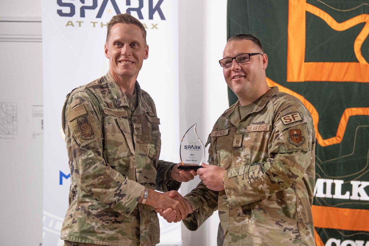 Master Sgt. David Spencer, 42nd Security Forces Squadron, won first prize, pitched acquiring wrong-way detection equipment at the annual Spark at the Max on April 7, 2023. The Spark tank-style event invests in the innovative and problem-solving ideas of Airmen and Guardians to improve readiness, recover Airmen's time, save costs, and increase the force's lethality. (U.S. Air Force photo by Sean Ross)