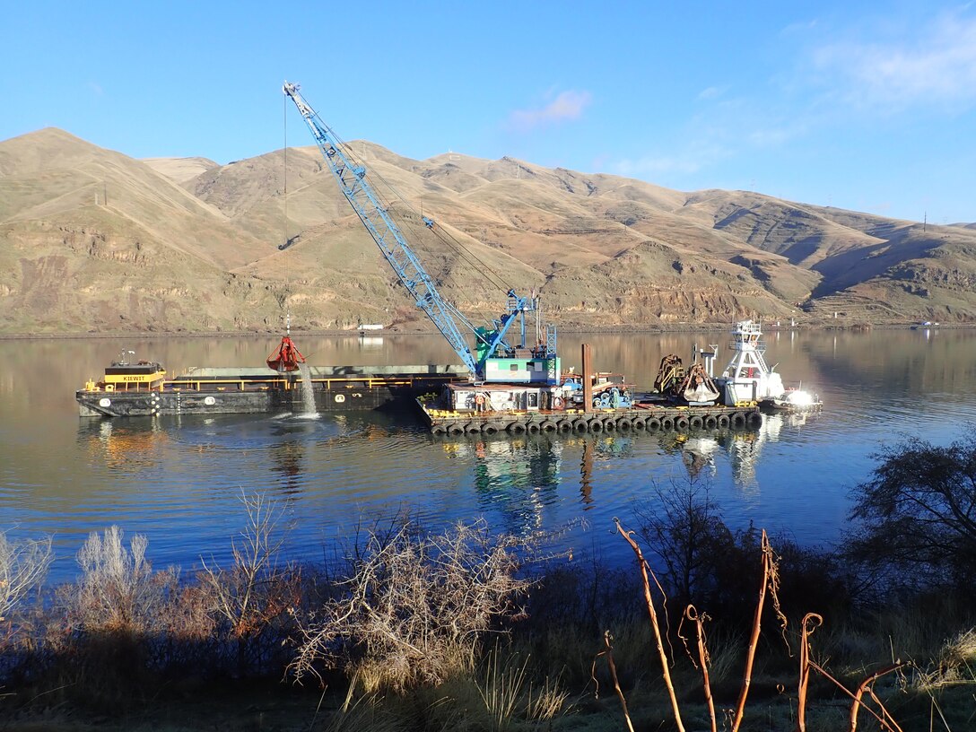 dredging scow on a sunny day