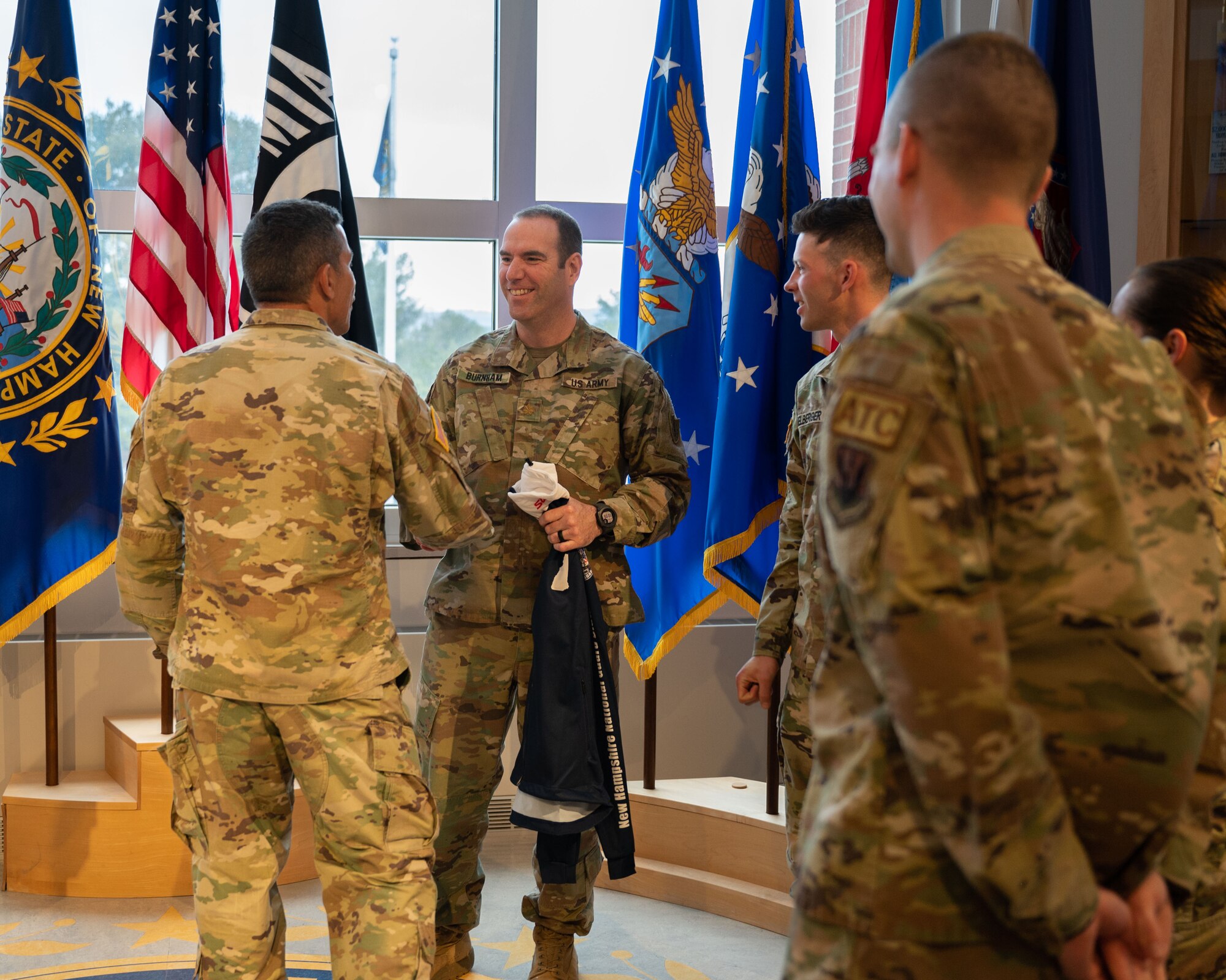 Soldiers shake hands